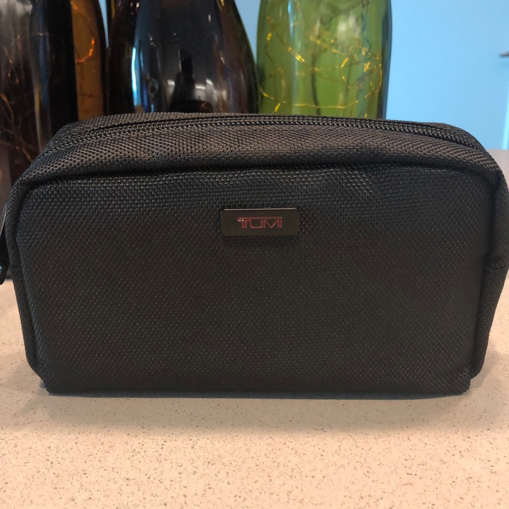 Black nylon TUMI cosmetic pouch